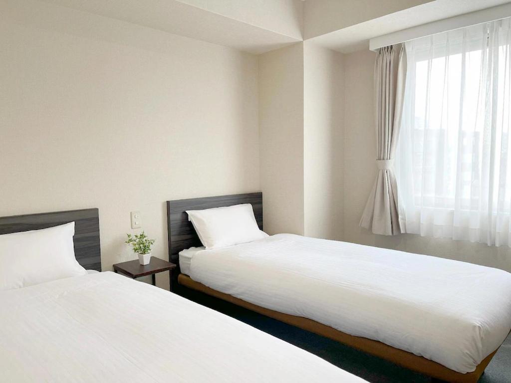 Checkinn Osaka Shinimamiya Bagian luar foto
